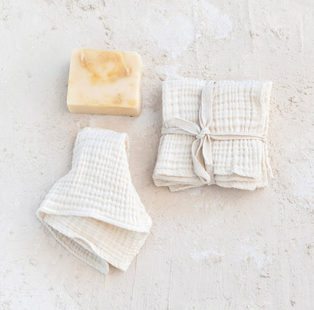 Set of 4 natural double cloth cotton dish cloths. 10" square. Bar of soap not included.