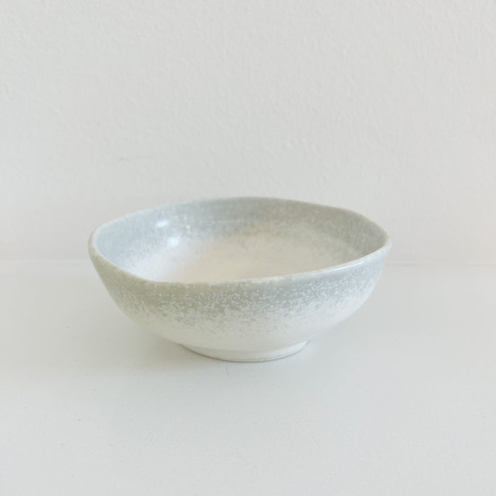 Medium Shoreline ceramic bowl with a creamy white glaze and blurred grey border. Measures 5 inch diameter 2 inch high.