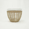 Medium glass serving bowl in a dried seagrass cage.