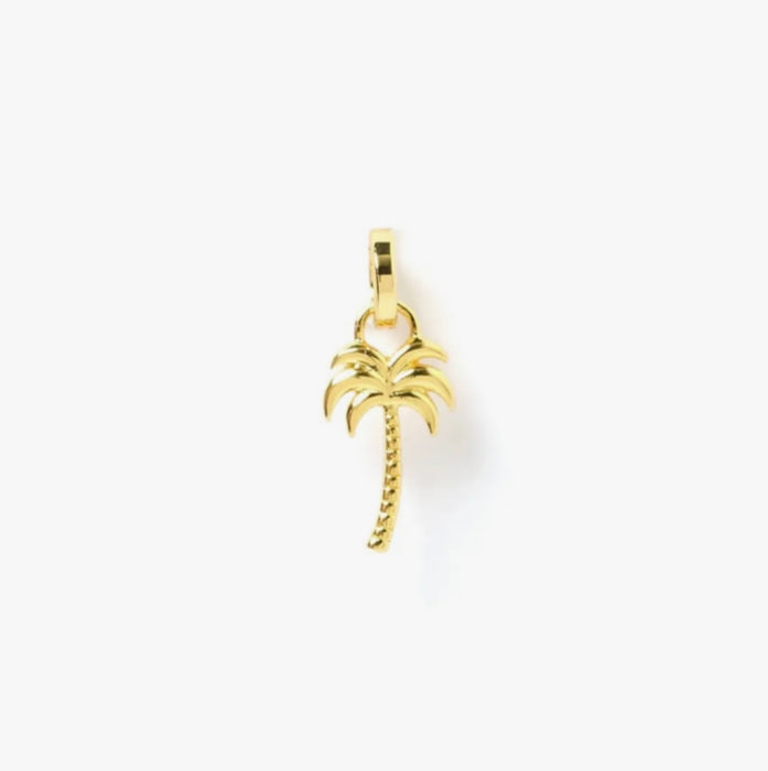 Golden palm tree charm. Designed to mix and layer on our charm builder necklaces, sold separately. 18k gold plating with E-coating, a premium finish to resist tarnish. Measures 3/4" high, 3/8" wide.