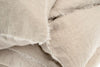 Close up of gently frayed edges on linen pillow shams. 100% linen in a neutral flax color. Sold as a set of 2 shams and matching duvet cover. 