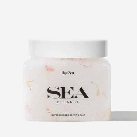 SEA soaking salts by Baja Zen. Frosted plastic square jar containing 20 oz./567 g of soothing soaking salts formulated to detoxify and cleanse the skin. Infused with fragrance notes of Maui sea salt, sand blossom and mandarin. 