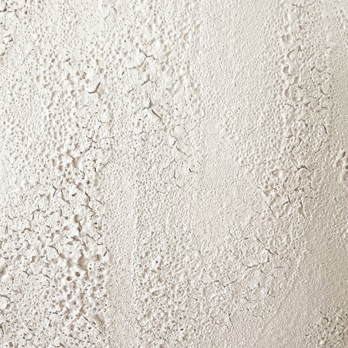 Close up of the textural matte white lava stone glaze on the Azores Vessel. Hand crafted by artisans in Portugal.