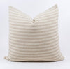 White Sands Pillow is made by artisan weavers in Thailand. Handwoven in a cream and sand stripe with a  subtle texture. A sophisticated layer for any modern, coastal or bohemian decor. Measures 20" x 20".  Insert included.