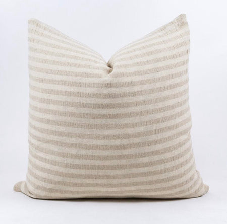 White Sands Pillow is made by artisan weavers in Thailand. Handwoven in a cream and sand stripe with a  subtle texture. A sophisticated layer for any modern, coastal or bohemian decor. Measures 20" x 20".  Insert included.