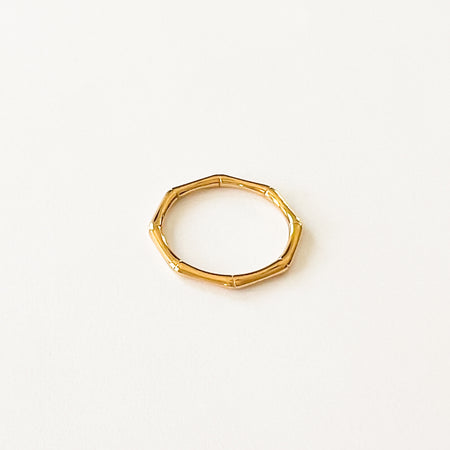 Bamboo Ring. Gold plating on marine grade stainless steel. Water and sweat resistant. Available in size 7 and 8. By Ellie Vail