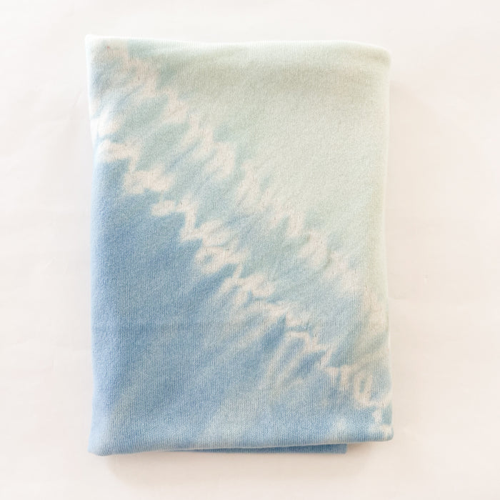 BEach Happy dip dyed cashmere wrap. Hand dyed using aritsan techniques in a combination of soft sea green, white and surf blue. 100% cashmere jersey. 32" x 90".