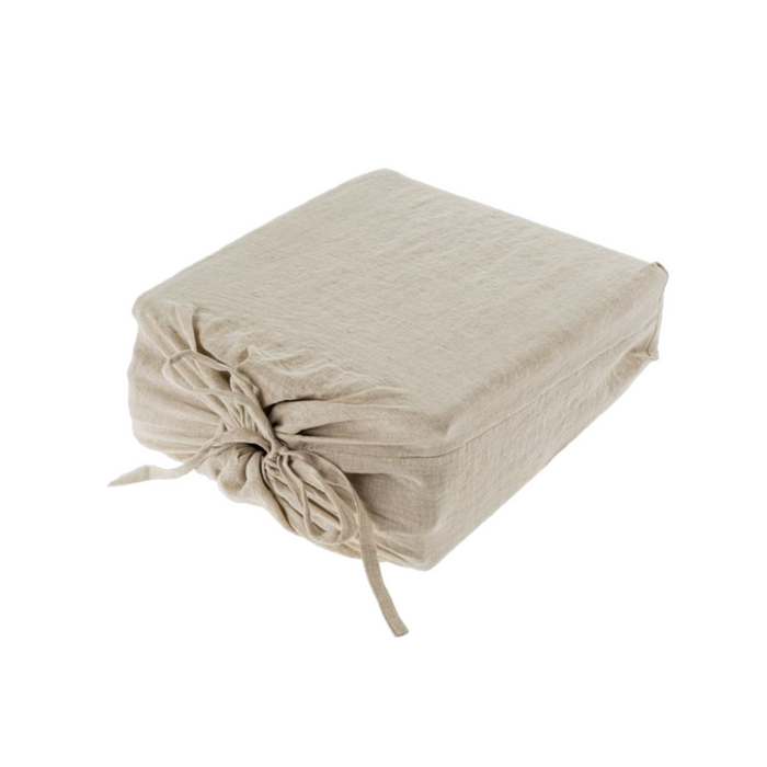 Linen duvet and sham set in neutral chambray drawstring pouch. Sold as a coordinating set, includes 2 pillow shams and 1 duvet cover. 100% linen in neutral flax color.