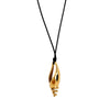 Gold spiral shell pendant on a black wax cord. Waterproof jewelry by Ellie Vail. 