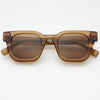 Translucent brown acetate sunglasses with a rectangular frame on a white background.