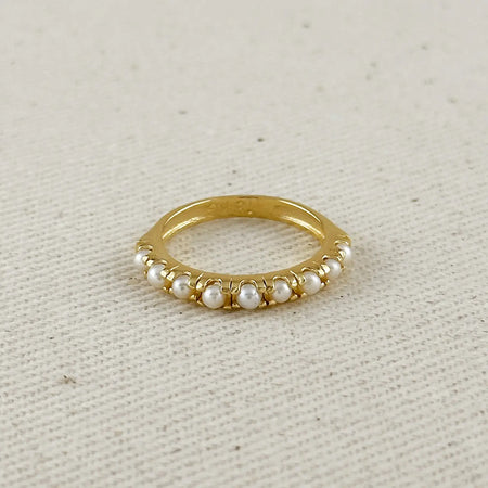 Delicate 18k gold filled band with tiny white fresh water pearls set around it. 
Size 8.5