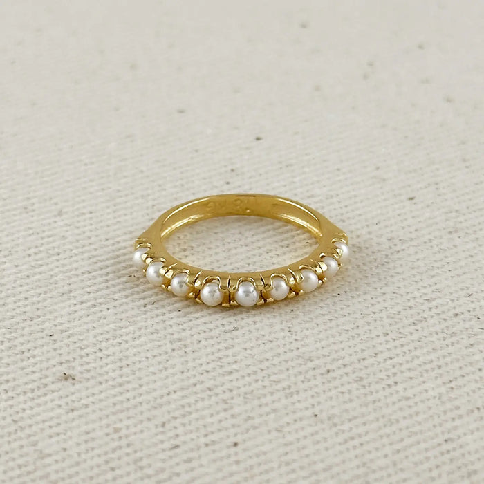 Delicate 18k gold filled band with tiny white fresh water pearls set around it. 
Size 8.5