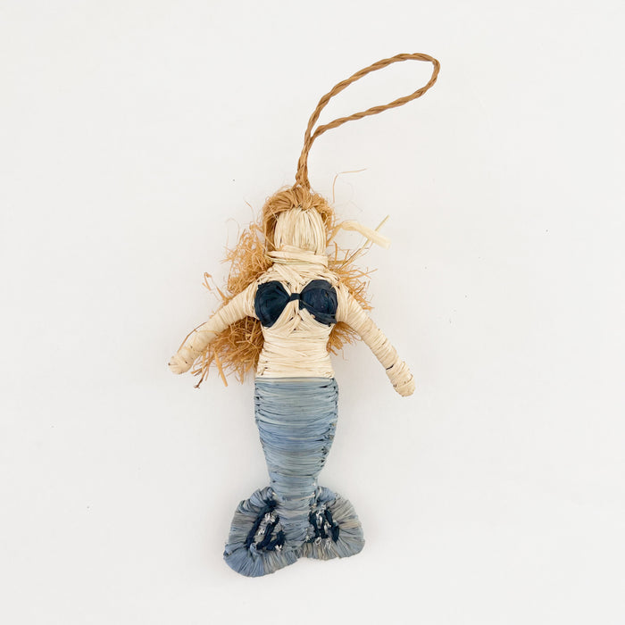 Handwoven Mermaid ornament made of natural and hand dyed raffia in soft shades of blue. Each sold separately. Hand woven by skilled artisans in Uganda.