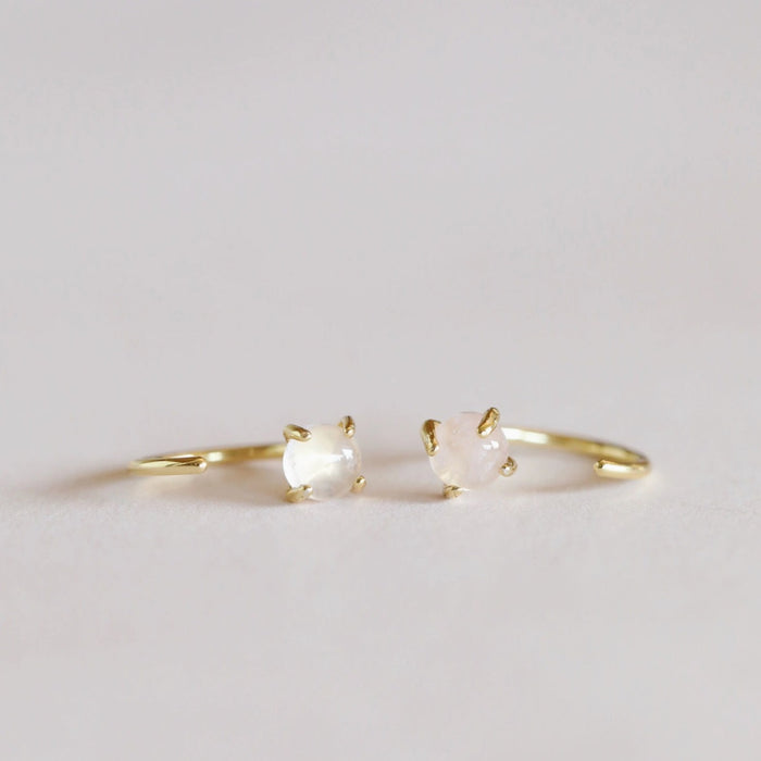 Rose Quartz huggie hoop earrings. Pair of delicate, open ended gold vermeil hoops with a small Rose Quartz stone.