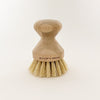 Bamboo dish brush made by Willow & Greene. Natural and sustainable bamboo dish brush with natural vegetable fiber bristles that are soft on dishes and tough on dirt and grease. 3 x 2.5 inches.