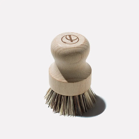 Natural bamboo dish scrubber with natural sisal bristles.