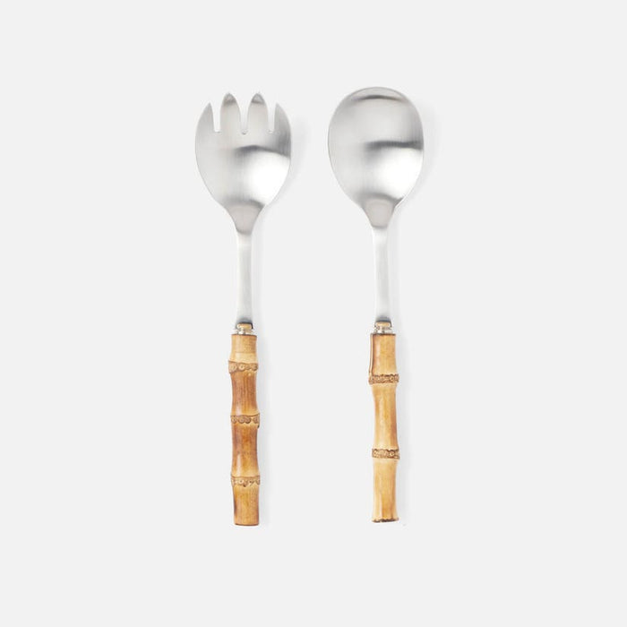 Bamboo Serving Set. Set of two stainless steel serving pieces with a bamboo handles. 9.75 inch length. Hand wash only.