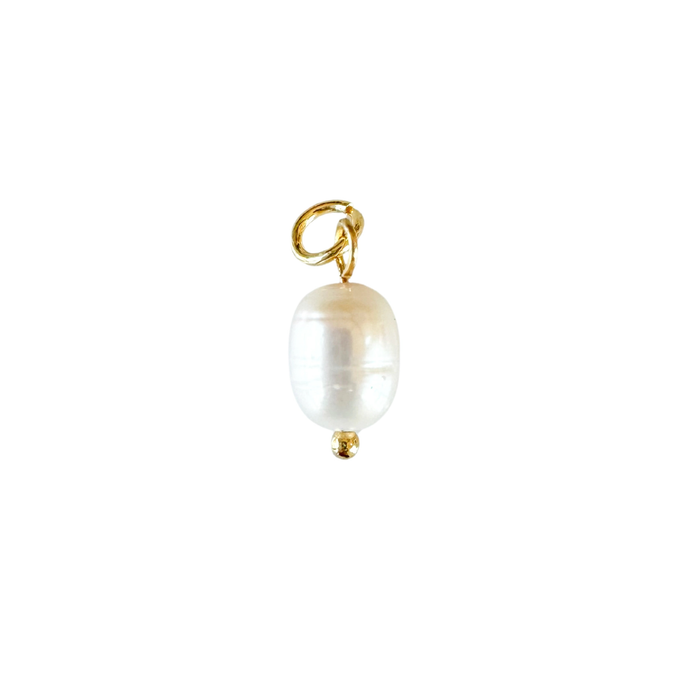 White pearl charm with gold filled fittings. Designed to layer onto necklaces or bracelets. .5 inch length, .25 inch diameter. Water and tarnish resistant.