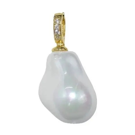 White Baroque Pearl with a gold and pave' clasp on a white background. 1 inch.