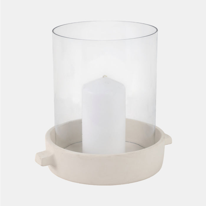 Clear glass hurricane candle holder with beige ceramic base. 10 inch high x 10 diameter.