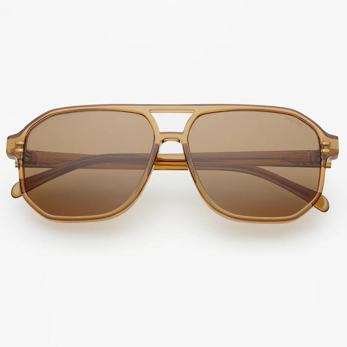 Aviator style sunglasses  with a translucent brown acetate frame on a white background.