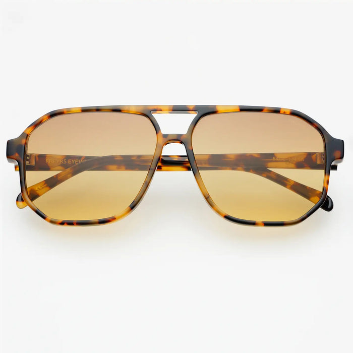 Aviator style sunglasses with tortoise frame and amber tinted lenses on a white background