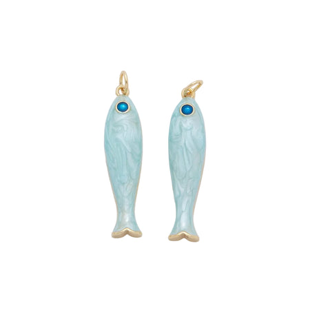 Two fish shaped charms in pale blue enamel with a blue CZ stone eye and gold accents. Each sold individually. 18K gold filled over brass.