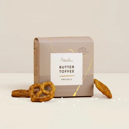Box of Butter Toffee Pretzels with pretzels on a light background