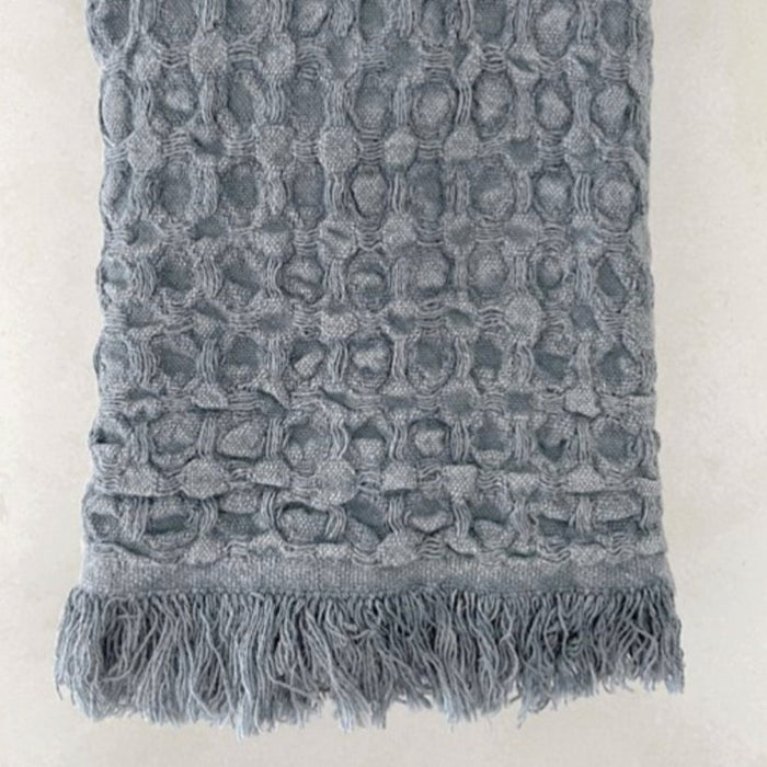 Storm grey luxe waffle hand towel. 100% cotton waffle weave with fringe ends. Made in Turkey. Measures 13" x 35".
