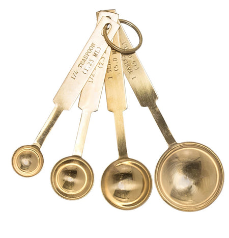 Set of 4 Bistro measuring spoons with Imperial and Metric measurements. Made of stainless steel with a warm brass finish. Measuring amounts are embossed in the handle.