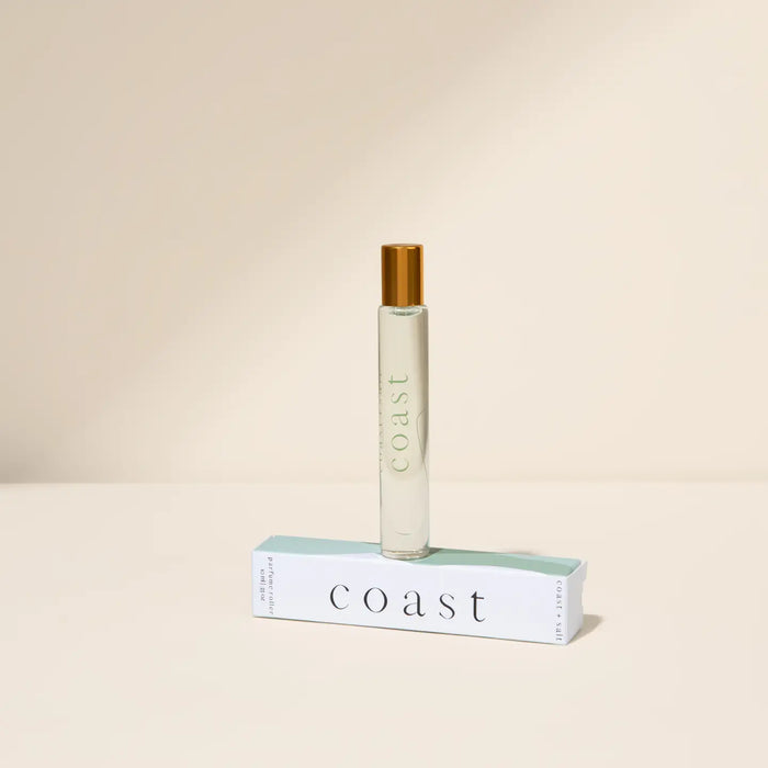 Roll-on perfume bottle in COAST fragrance with matching box. Fragrance notes of Olive Leaves, Fresh Fig and Australian Sandalwood. 10 mL