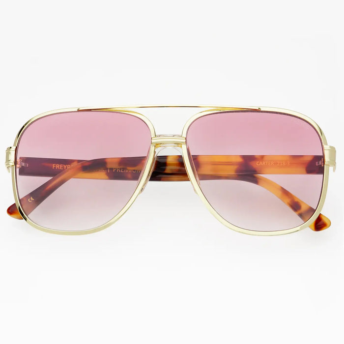 Classic gold frame aviator sunglasses with tortoise arms and a rose tinted lense.