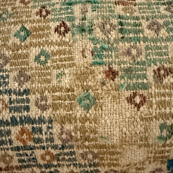 Close up of the weave and wear on a vintage Turkish pillow. The wear is considered part of the natural beauty of these vintage treasures.