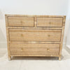 Delray chest of drawers/dresser.  6 drawer dresser made of solid wood hand wrapped in natural rattan with woven rattan panels on sides, top and drawer face. Finished with clean brass leg caps and minimalisic brass pulls. Perfect for the modern coastal home.
Measures: 36"W x 18"D x 30.5"H