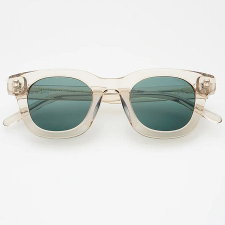 Sunglasses with a pale grey translucent acetate frame on a white background.