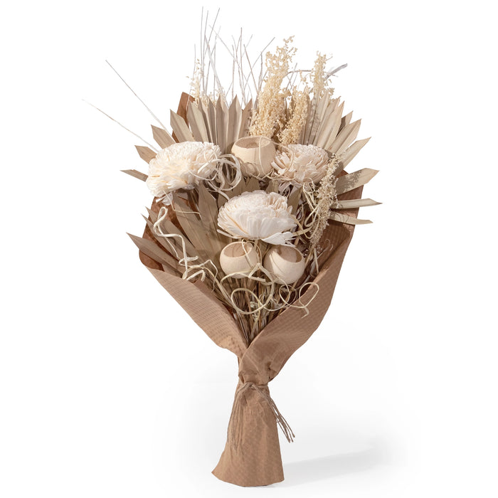 Dried flower and palm bouquet wrapped in brown Kraft paper. Natural dried foliage from California. Perfect way to add Fall vibes to a beach house. Each bouquet measures approximately 25"