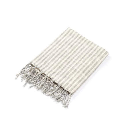 Newport Turkish towel. Soft grey and white bengal stripe towel hand loomed in all natural raw Turkish cotton. Each end is finished with hand twisted fringe ends. Perfect for bath, pool or beach. Measures 76" x 40".