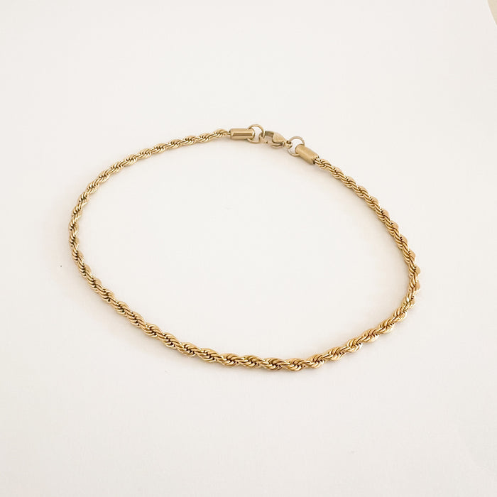 Tate rope chain anklet. 9" golden rope chain with lobster claw. Water, sweat and tarnish resistant. Made of hypoallergenic stainless steel with gold plating by Ellie Vail.