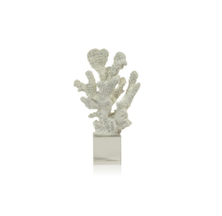 Artificial white coral on a clear acrylic stand.