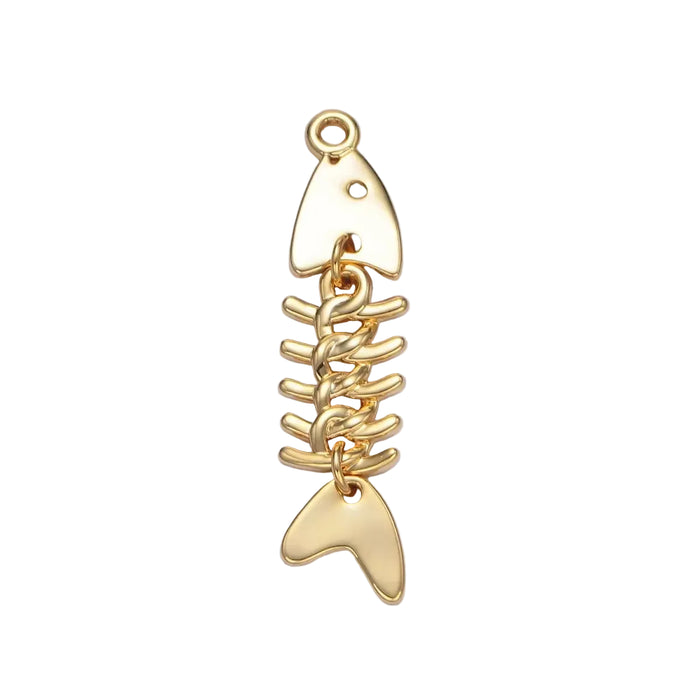 Minimalist gold fish bone charm on white background. 