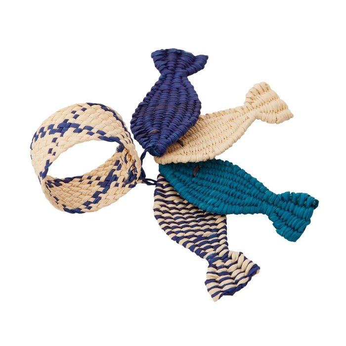 Woven napkin ring featuring four sardine charms in indigo, natural, teal and a teal/natural mix. Handwoven using Toquilla Palm by female artisans in Columbia. Sold as set of 2.