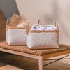White rectangular bamboo storage baskets with natural bamboo edge and rope handles. Medium  15" length 11" width 9" high. Large is 18.5" length 13" width 10" high. Each sold separately.