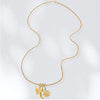 Gia rope chain necklace shown layered with 3 different charms. Charms sold separately. 