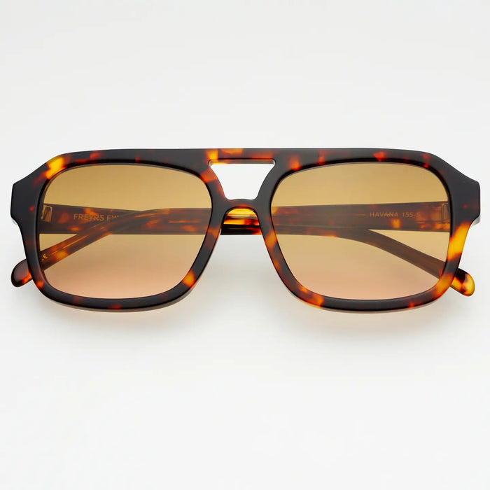 Classic aviator shape sunglasses in a warm brown tortoise acetate frame with tinted lenses.