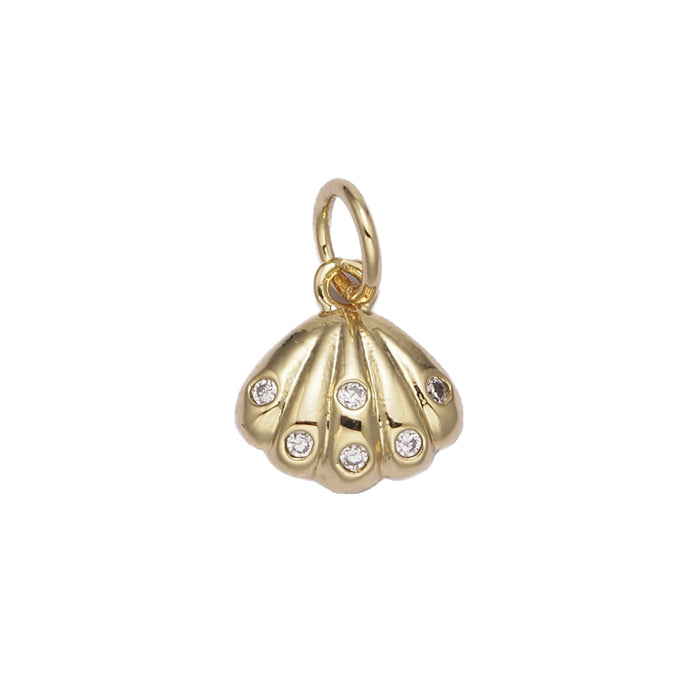 Mini gold filled shell charm inlaid with tiny CZ crystals. Designed to layer, mix and match with our Liya charm builder necklace, sold separately. Measures 1/4" x 3/8". 