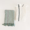 Set of two Rosemary waffle hand towels. 100% cotton with fringe ends. One white towel with sage green and grey stripe, one sage green towel with white/grey stripe. Measures 28" x 18"