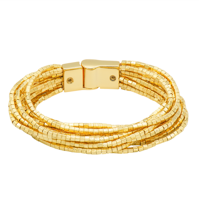 A gold multi-strand beaded wrap bracelet with a polished gold magnetic clasp, shown on a plain white background. Designed by Marcia Moran. Made of 18k gold plated over brass.