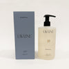 LAVUNE Santal hand soap bottle and smokey blue packaging on a light background. 450 mL bottle.
