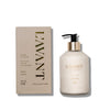 L'AVANT Ambre Santal scented hand lotion in taupe bottle and box with gold lettering. 