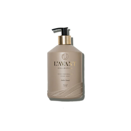 L'AVANT Ambre Santal hand soap in a taupe glass bottle with gold lettering on a white background. 16 fl oz.
